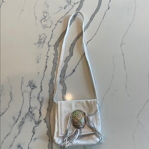 Chic White Crossbody Bag with Fringe
